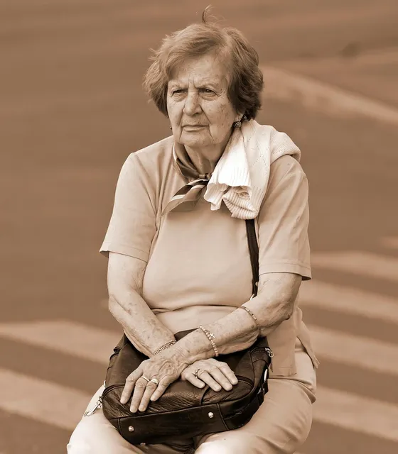 caregiver exercising an elderly