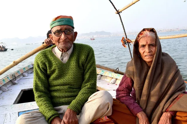 elderly couple and caregiver