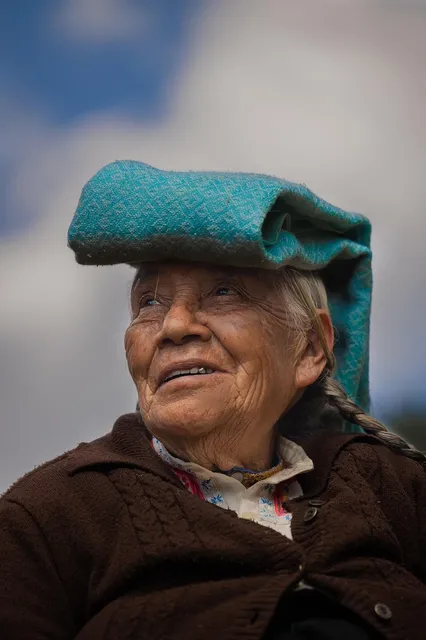 caregiver combing the elder woman's hair